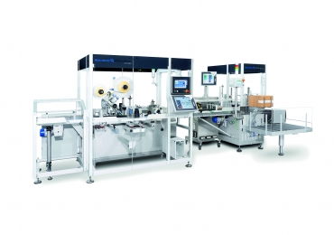 1.Romaco Promatic PTT track & trace machine in line with the Romaco Promatic PAK 130 case packer